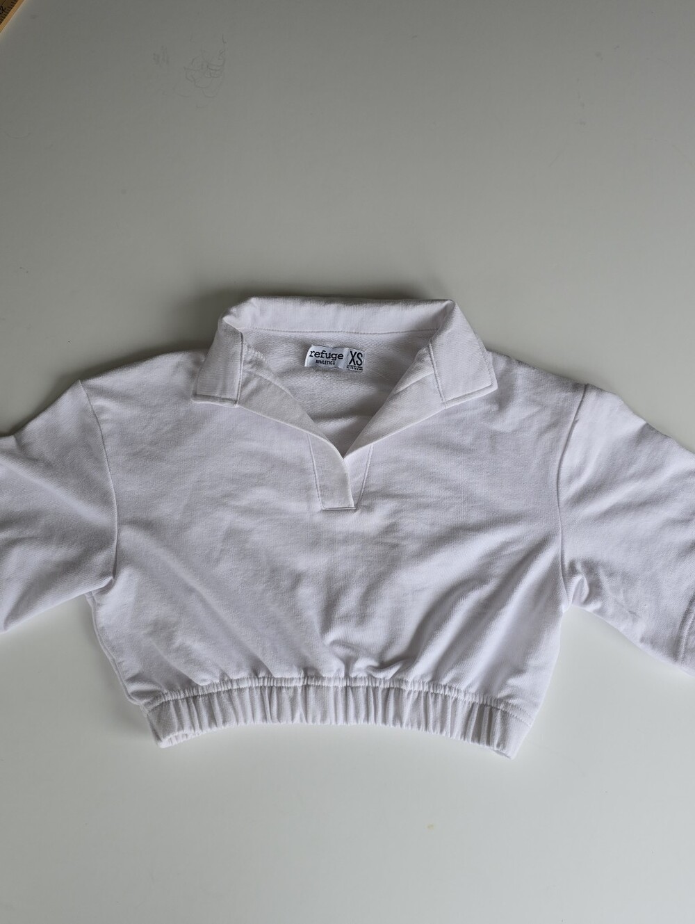 Refuge White Cropped Polo with Elastic Hem